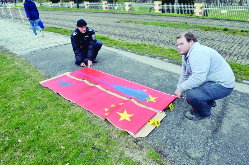 Chinese flags defaced in Prague ahead of president’s visit