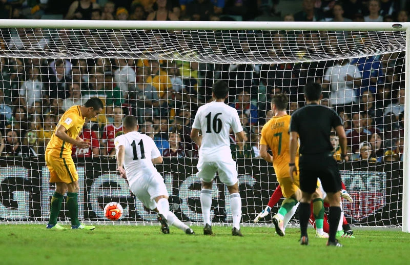 Aussies, Japan go through; China stuns Qatar