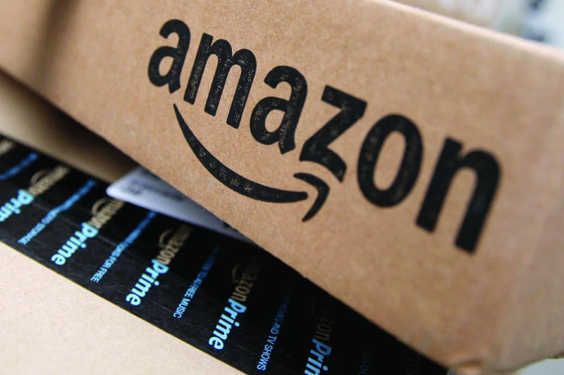 Amazon boxes are seen stacked for delivery in the Manhattan borough of New York City. (Reuters)