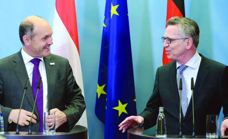 MIGRATION TALKS: German Minister of the Interior Thomas de Maiziere, right, and his new Austrian counterpart Wolfgang Sobotka during a press conference in Potsdam, Germany, on Friday. (AP)