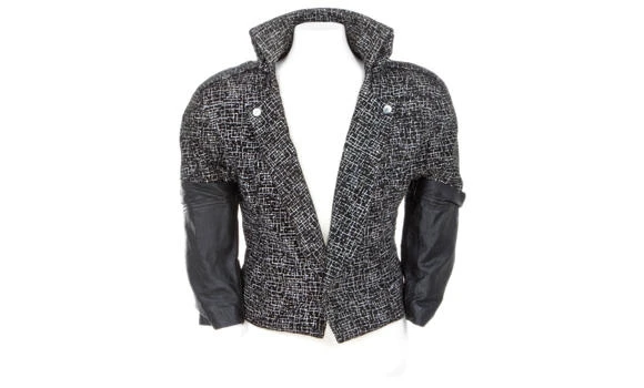 SIGNATURE ITEM: The black and white blazer with leather sleeves, worn by Prince in the 1984 film, “Purple Rain.” The item will be auctioned on June 29. (AP)