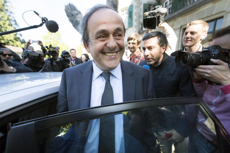 LAST TRY: Michel Platini is surrounded by media after leaving the international Court of Arbitration for Sport, CAS, after a hearing in Lausanne, Switzerland, Friday. (AP)