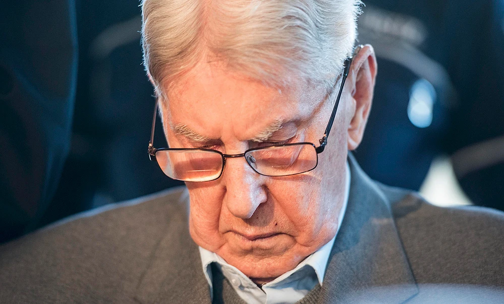 PLEADS GUILTY: SS sergeant Reinhold Hanning sits in the courtroom in Detmold, Germany, on Friday. (AP)