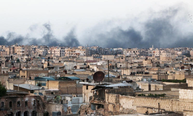Smoke rises after airstrikes on the rebel-held al-Sakhour neighborhood of Aleppo, Syria on Friday. (Reuters)
