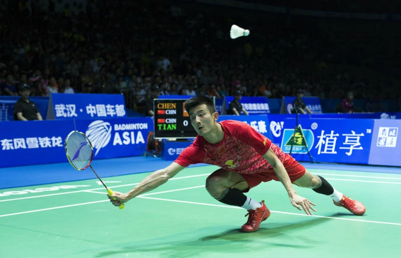 FAVORITE: Chen Long hits a return to Tian Houwei during their men's singles semifinal match at the Badminton Asia Championships in Wuhan, central China's Hubei Province on Saturday. (AFP)