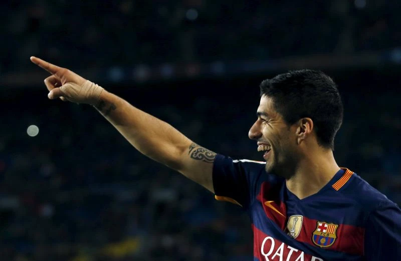 MAN IN FORM: Luis Suarez scored four times in each of Barca's last two games to streak three ahead of Cristiano Ronaldo in the race to be the league's top scorer.(Reuters)