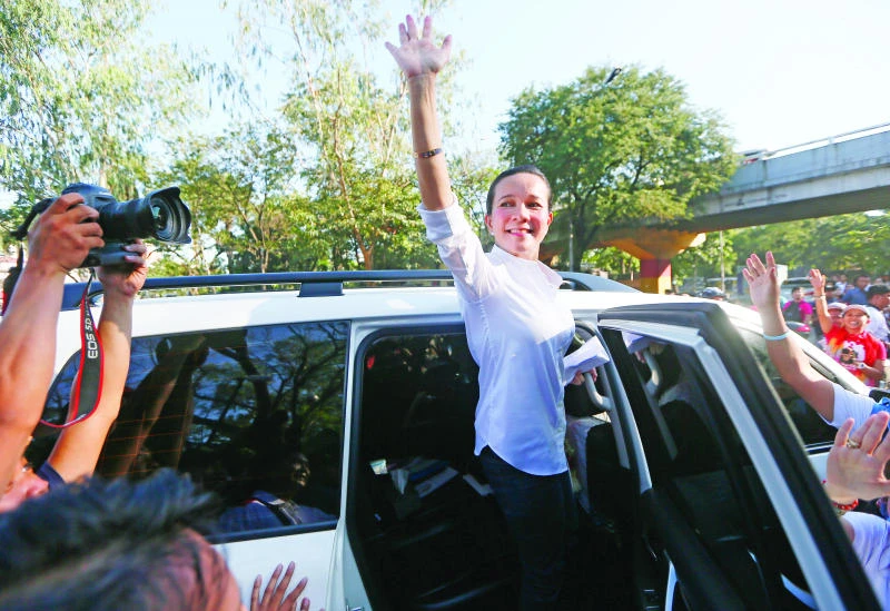Life story, movie star father lift Poe in Philippines’ race