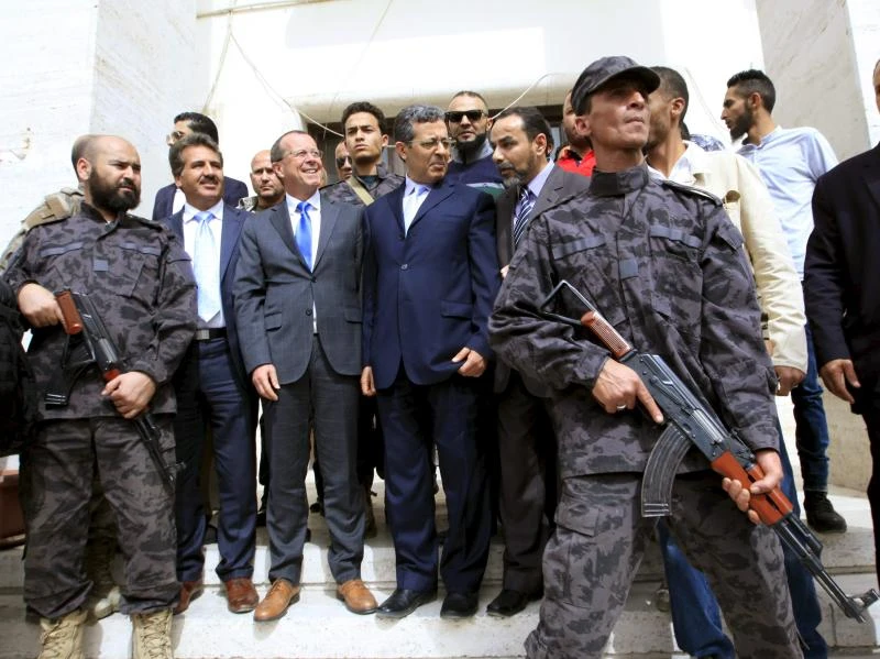 Libya unity govt cements control after rival cedes power