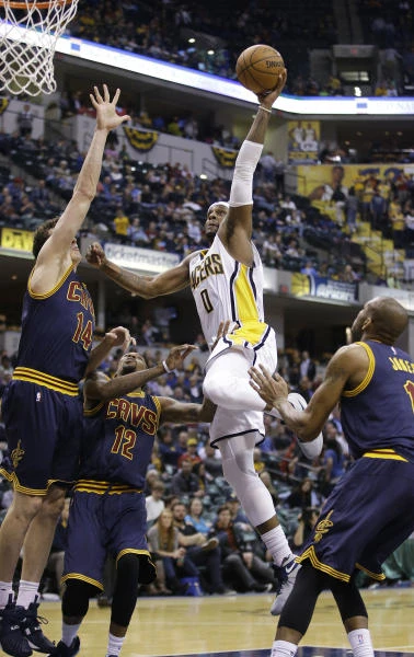 With James on bench, Pacers roll past Cavaliers 123-109