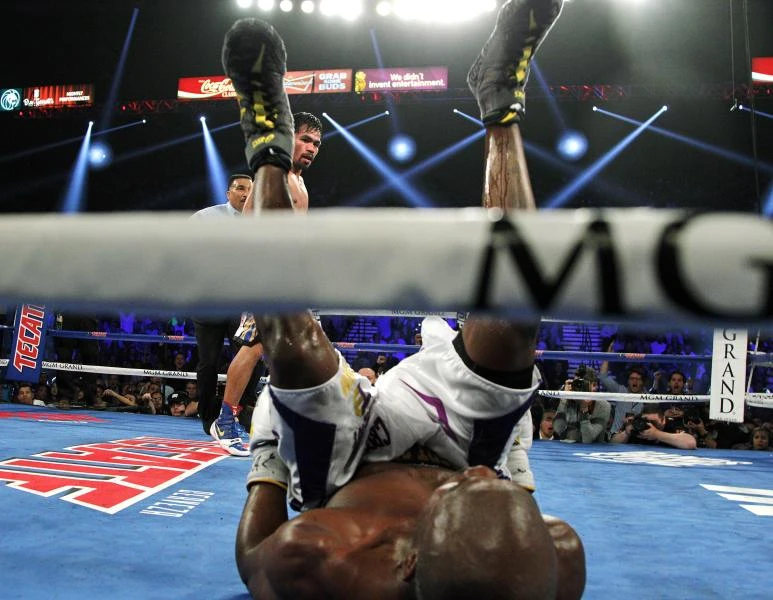 Vintage Pacquiao demolishes Bradley in farewell fight