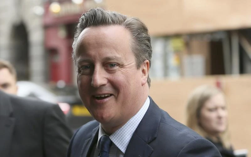 UK leader Cameron publishes tax returns, aims to defuse row