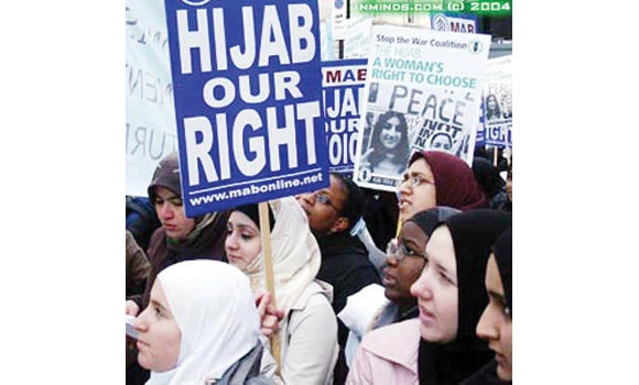 French government divided on head scarf ban at universities