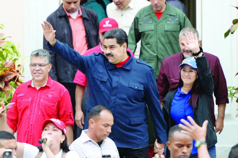 Energy-short Venezuela creates new holiday, time zone