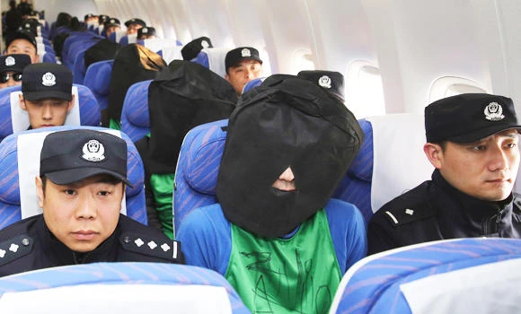 China criticizes Taiwan for releasing fraud suspects