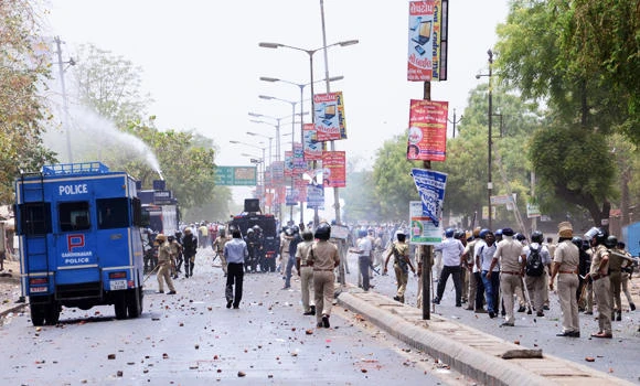 Indian PM’s state flares again over caste, hundreds held