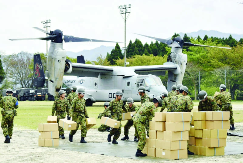 Japan battles to care for 100K evacuees after quake