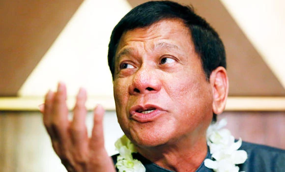 Philippine candidate stays defiant despite uproar over rape remarks