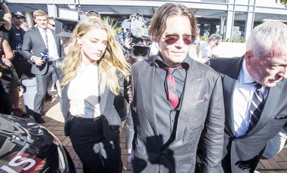 War on terrier: Johnny Depp’s wife pleads guilty