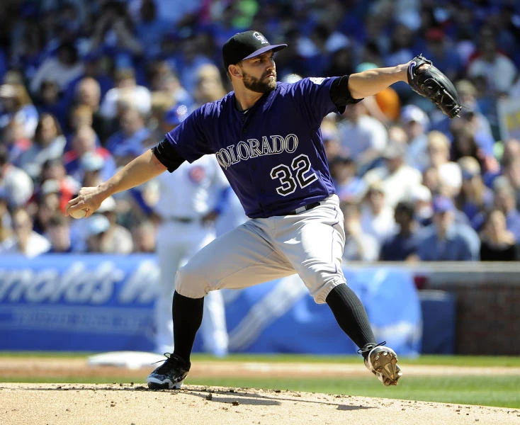 Rockies hang tough to beat Cubs 2-0