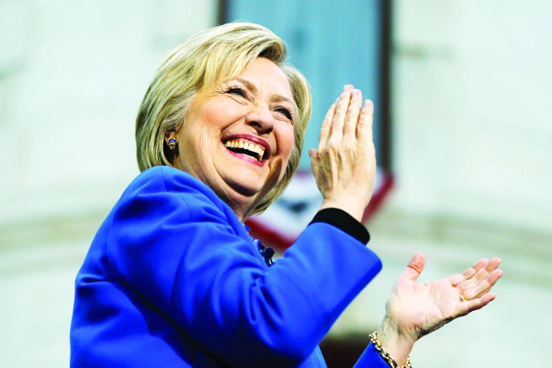 Trump says Clinton using ‘woman card’
