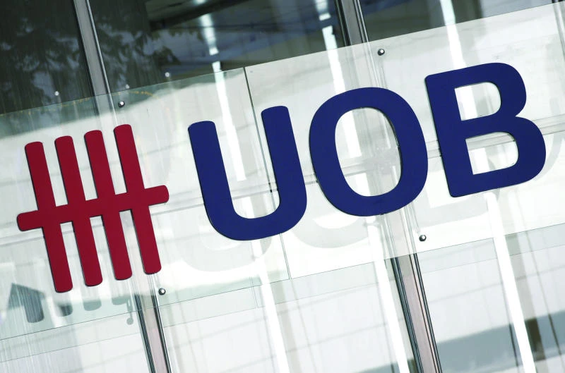 A logo of the United Overseas Bank Limited outside a branch in Singapore’s central business district. (Reuters)