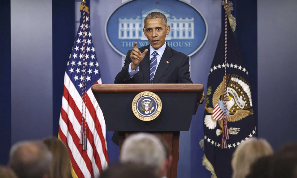 US President Barack Obama holds his last news conference of the year at the White House before leaving for his annual Hawaiian Christmas holiday in Washington on Friday. (REUTERS/Carlos Barria)