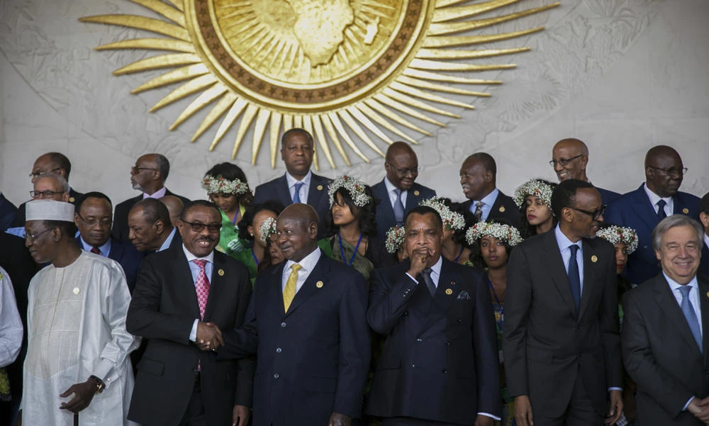 Leaders gather for a group photo of the 28th Ordinary Session of the Assembly of the African Union in Addis Ababa, Ethiopia,on Monday. (AP Photo/Mulugeta Ayene )