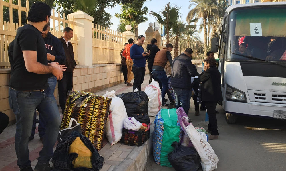 Christian families who left from Al-Arish in the North Sinai Governorate after the escalation of a campaign targeting Christians by Daesh militants last week, arrive at the Evangelical Church in Ismailia, Egypt, on February 24, 2017. REUTERS/Ahmed Aboulenein