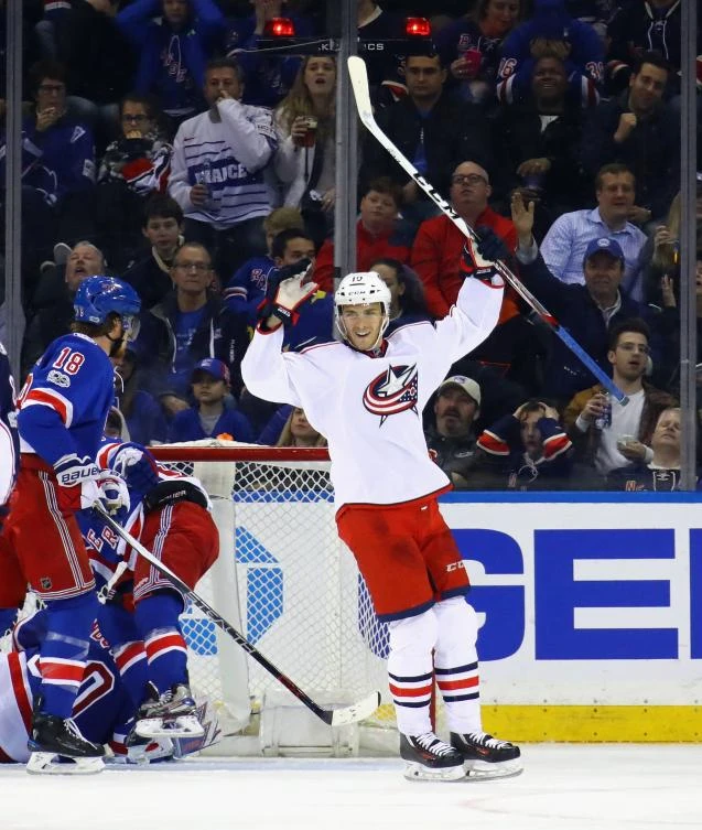 Alexander Wennberg of the Columbus Blue Jackets celebrates his goal at 9:47 of the second period against the New York Rangers at Madison Square Garden on Sunday in New York City. (AFP)
