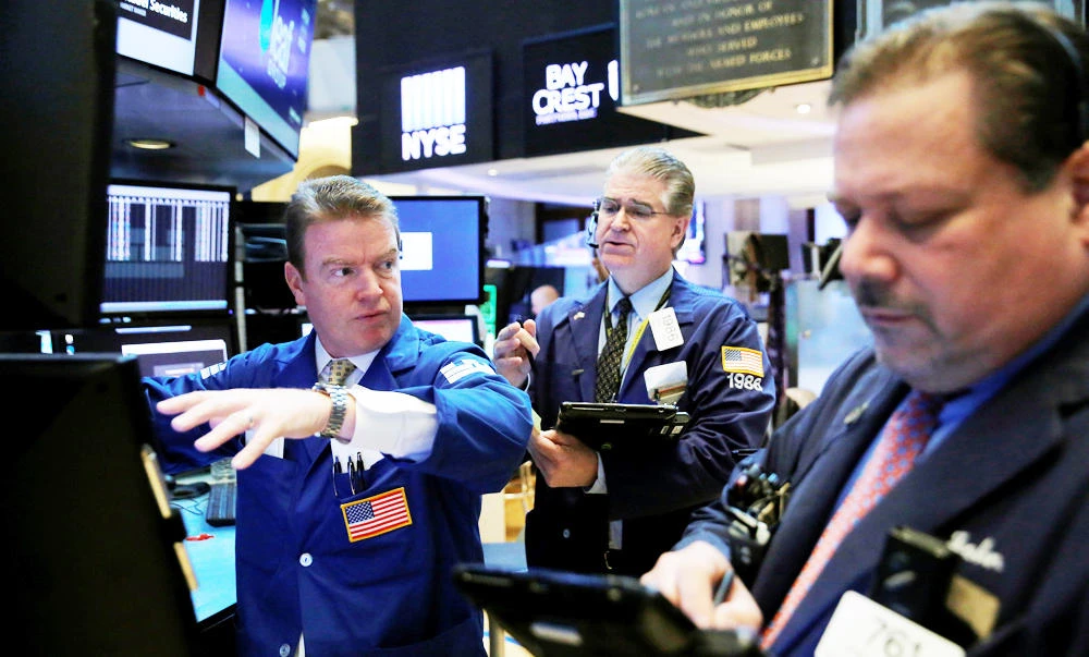 Traders work on the trading floor at the opening of the markets at the New York Stock Exchange (NYSE) in Manhattan, New York City, U.S., on Monday. (REUTERS)