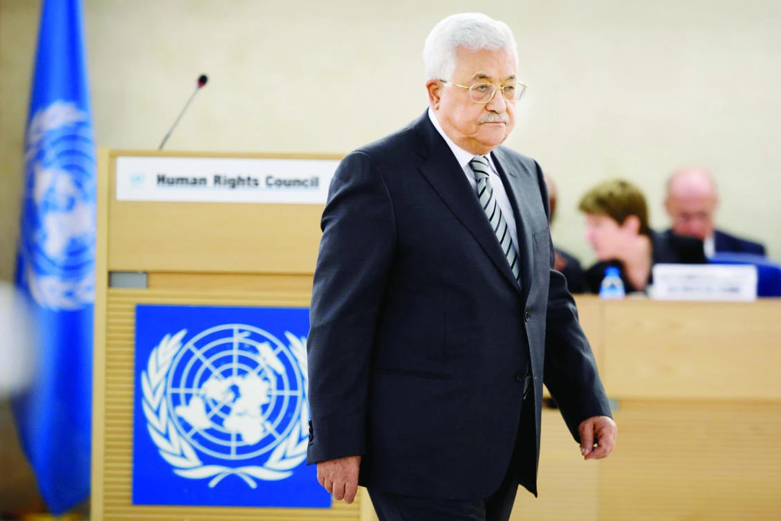 Palestinian President Mahmoud Abbas arrives to delivers a speech during the United Nations Human Rights Council in Geneva on Monday. (AFP)
