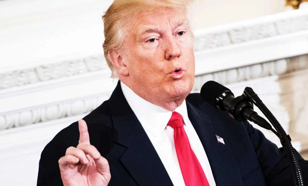 US President Donald Trump speaks to members of the National Governors Association and his administration before a meeting in the State Dining Room of the White House on Monday in Washington, DC. (AFP)