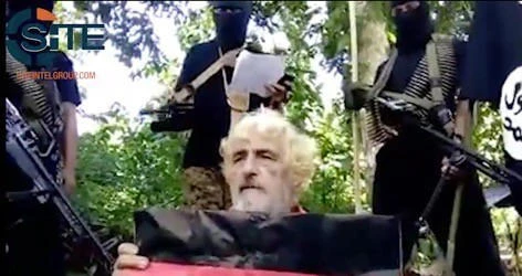 In this undated image made from militant video and released by SITE Intel Group on Feb. 24, 2017, shows German hostage Jurgen Gustav Kantner at an undisclosed location. Abu Sayyaf extremists in the Philippines have released a video of the beheading of Kantner. (SITE Intel Group via AP)
