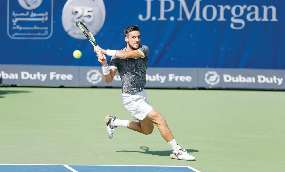Damir Dzumhur in action against defending champion Stan Wawrinka Tuesday in the Dubai Tennis Championships. (AN photo)