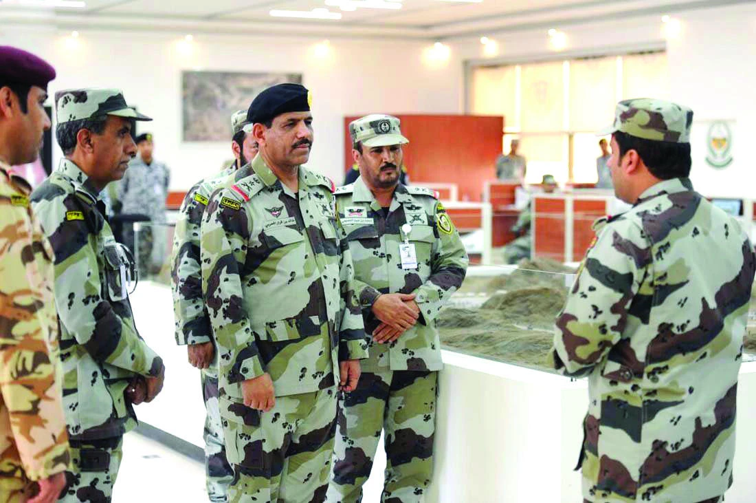 Lt. Gen. Khaled bin Qarar Al-Harbi, commander of the Special Emergency Forces, listens to a briefing at the Mohammed bin Naif Center for Special Operations and Developed Applications, in Madinah on Tuesday. (SPA)