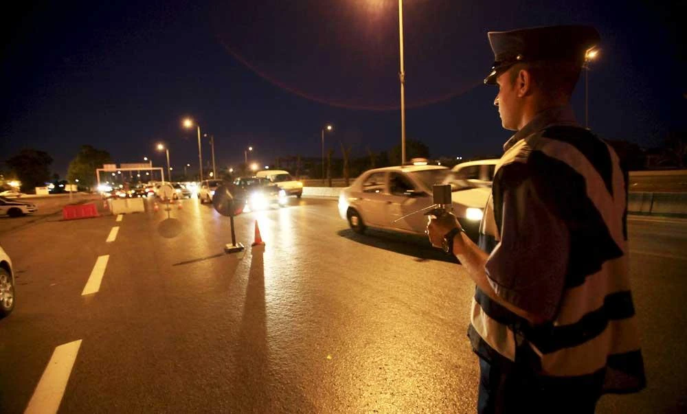 A policeman holds an explosives detector at a checkpoint in Algiers, Algeria, in this photo taken on June 26, 2015. (REUTERS)