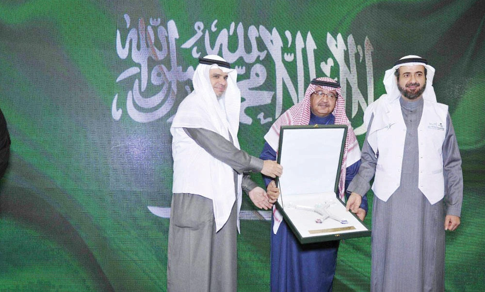 Ahmad Al-Issa, education minister, Abdullah Yousef Al-Nafie, and
Tawfiq Al-Rabiah, health minister.