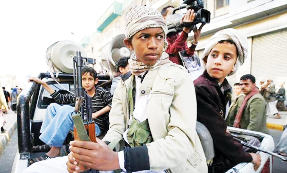 Houthi child soldiers hold weapons during a demonstration in Sanaa in this March 13, 2015 photo. (Reuters)