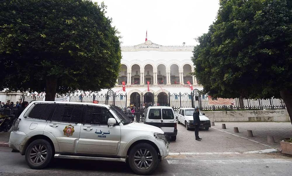 Tunisian police forces stand guard in front of the court in Tunis, in this file photo. (AFP)