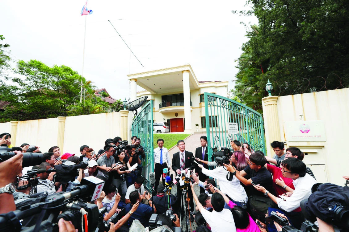 Ri Tong Il, former North Korean deputy ambassador to the United Nations, speaks to journalist outside the North Korean Embassy in Kuala Lumpur on Thursday. (AP)