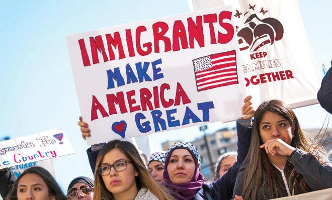 Protesters gather at the Milwaukee County Courthouse where they attend a rally against President Donald Trump’s policy on immigration, in this Feb. 13 photo. (AFP)
