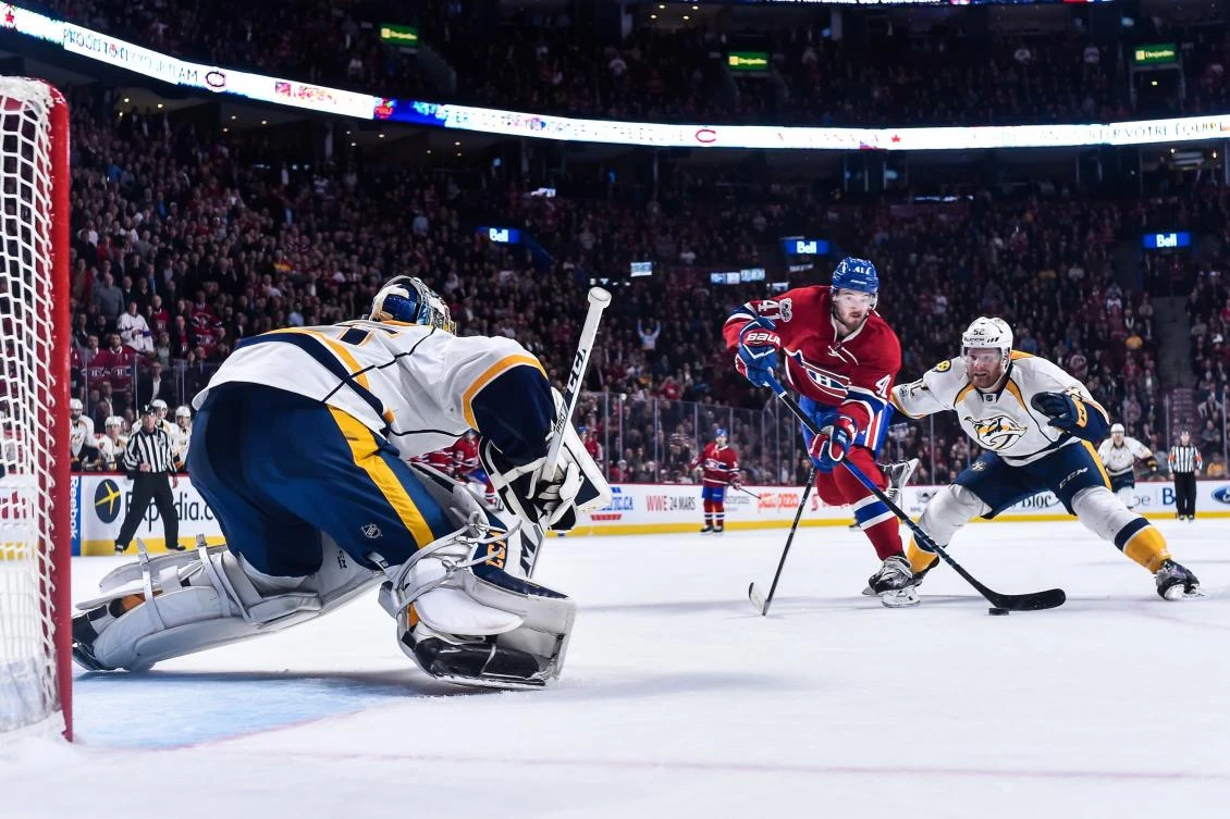 Paul Byron (41) of the Montreal Canadiens skates the puck past Matt Irwin (52) of the Nashville Predators and ended up scoring the game-winning goal on goaltender Pekka Rinne (35) of the Nashville Predators late in the third period during the NHL match at the Bell Centre in Montreal, Quebec, on Thursday night. (AFP)