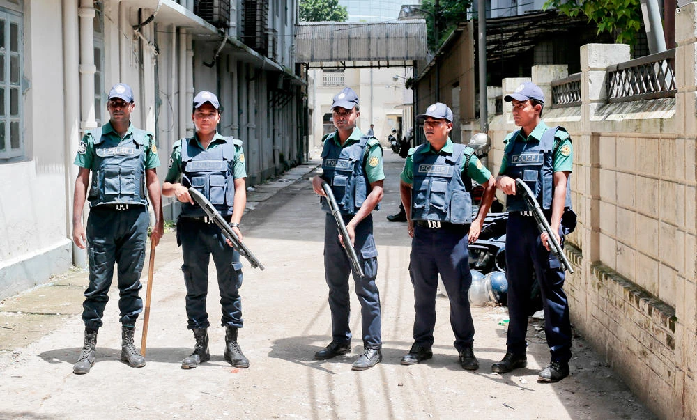 In this July 27, 2016, file photo, Bangladeshi policemen stand guard in Dhaka, Bangladesh. (AP)
