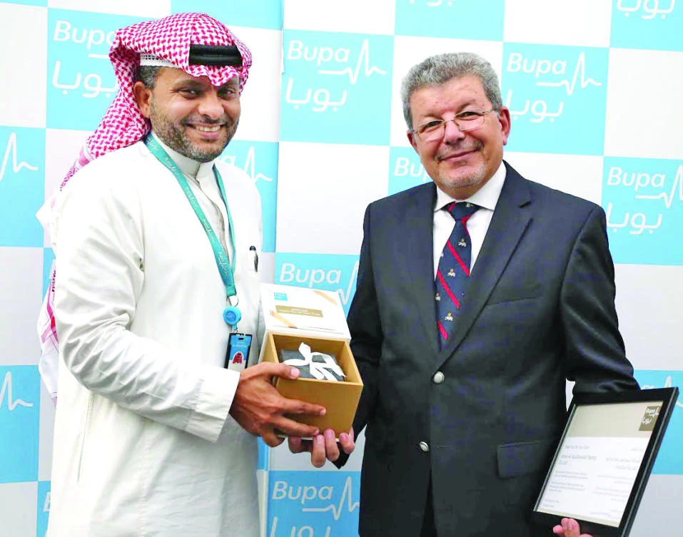 Ali Sheneamer, CCO, Bupa Arabia, left, and Hisham Orabi, managing director, IATCO, during the event in Jeddah.