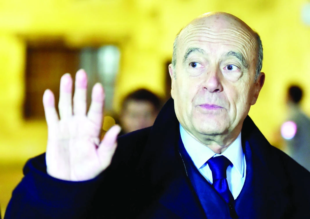 Mayor of Bordeaux Alain Juppe gesturing as he arrives to a literary meeting in Bordeaux in this file photo. (AFP)
