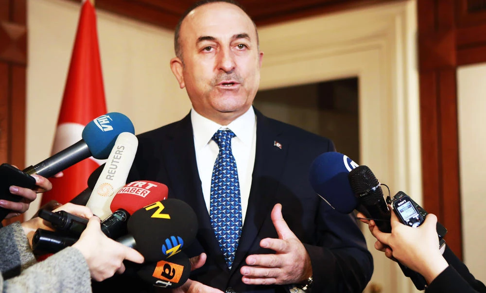 Turkey's Foreign Minister Mevlut Cavusoglu answers the press after meeting his counterpart, Hungarian Minister of Foreign Affairs and Trade Peter Szijjartoin (unseen) at the Foreign Ministry's residence in Ankara, on Friday. (AFP)