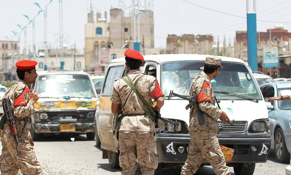 Yemeni soldiers stand guard in the capital Sanaa, in this April 20, 2014 file photo. (AFP)