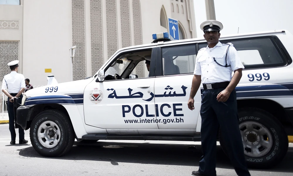 Members of the Bahraini security forces man a checkpoint outside a Mosque in Manama, in this June 5, 2014 file photo. (AFP)