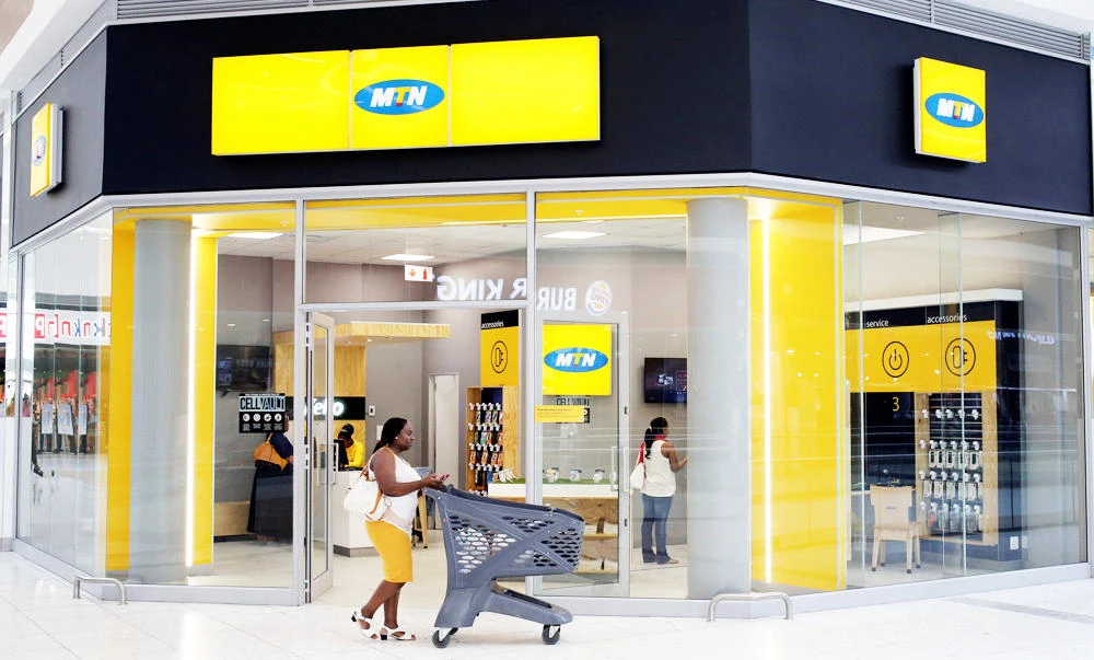 A shopper walks past an MTN shop at a mall in Johannesburg, South Africa, in this March 2, 2017 photo. (REUTERS)