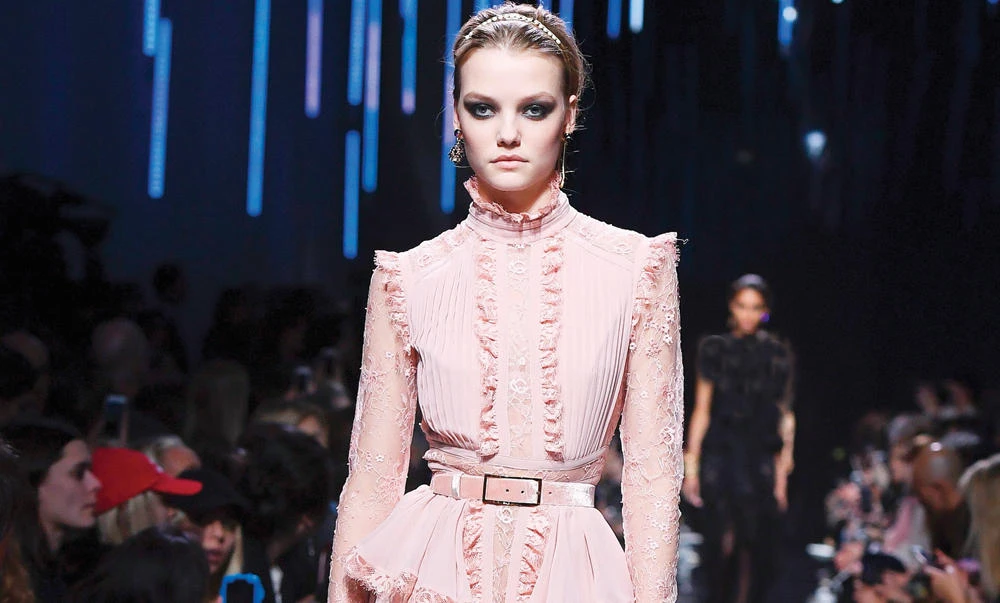 A model presents a creation by Elie Saab during the women’s fall-winter 2017-2018 ready-to-wear collection fashion show, on Saturday in Paris. (AFP)